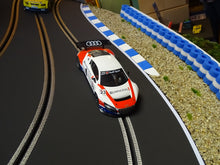 Carregar imagem no visualizador da galeria, NSR Audi R8 Modellbau mit Reifenstapel blau weiss